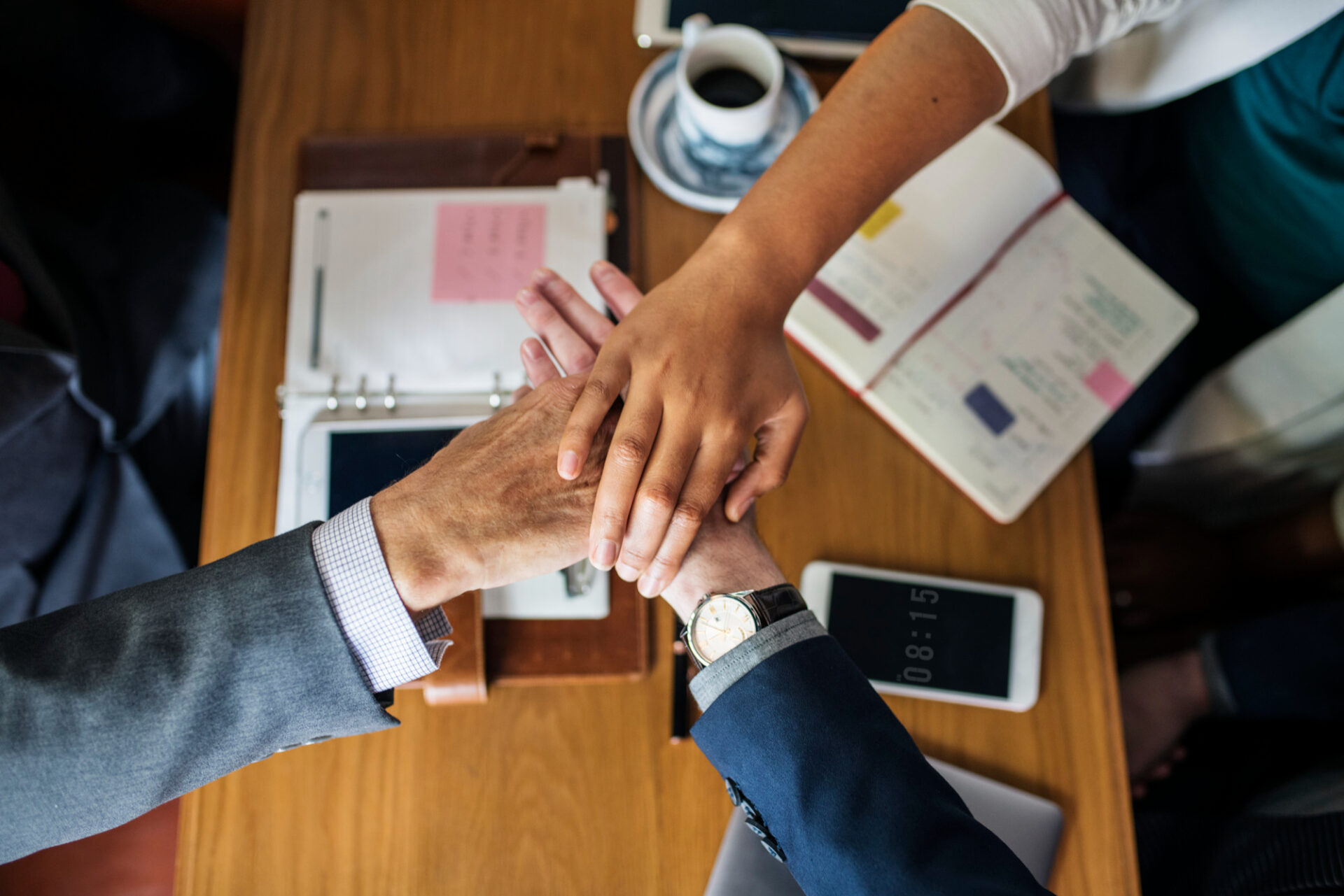 team business people stacking hands